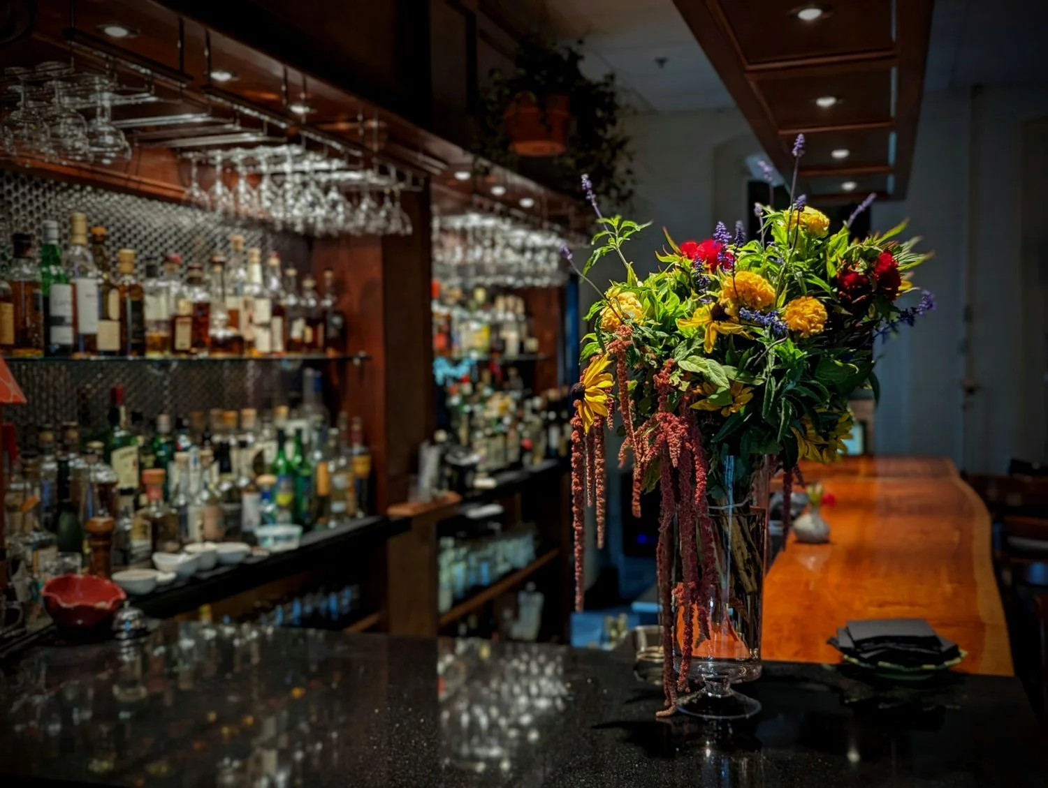 Harmony Loft bar with floral arrangement in downtown Brattleboro VT